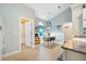 Bright dining area featuring a vaulted ceiling, pendant lighting, and views of the backyard at 9590 Crosscut Dr, Ladson, SC 29456