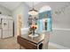Dining area featuring gray walls, a drop leaf wooden table, and decor at 9590 Crosscut Dr, Ladson, SC 29456