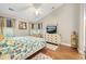 Spacious main bedroom featuring a vaulted ceiling, ceiling fan, and natural light at 9590 Crosscut Dr, Ladson, SC 29456