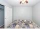 Bedroom features closet, ceiling fan and large floral comforter at 100 Pine Hall Dr, Goose Creek, SC 29445