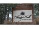 Welcome to Liberty Hall Plantation, where a brick sign with elegant script invites you to experience premier living at 100 Pine Hall Dr, Goose Creek, SC 29445