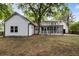 Wide view of the backyard, showcasing a large lot, house and porch at 1019 Royalist Rd, Mount Pleasant, SC 29464