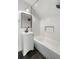 Bathroom with black and white tile, bathtub and vanity at 1019 Royalist Rd, Mount Pleasant, SC 29464