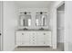 Bathroom featuring a dual vanity with marble countertops and modern lighting at 1019 Royalist Rd, Mount Pleasant, SC 29464
