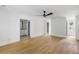 Spacious bedroom with gleaming hardwood floors and a ceiling fan at 1019 Royalist Rd, Mount Pleasant, SC 29464