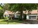Beautiful home exterior showcasing lush landscaping and a convenient two-car garage at 1019 Royalist Rd, Mount Pleasant, SC 29464