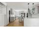 Modern kitchen featuring white cabinets, stainless appliances, light countertops and wooden flooring at 1019 Royalist Rd, Mount Pleasant, SC 29464
