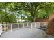 An expansive rooftop deck offers views of the surrounding greenery at 1019 Royalist Rd, Mount Pleasant, SC 29464