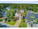 Inviting two-story house boasting a landscaped yard, covered porch, and convenient two-car garage at 104 Wando Reach Rd, Wando, SC 29492