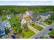 Desirable home with a well-maintained lawn, lush landscaping, and an attached two-car garage at 104 Wando Reach Rd, Wando, SC 29492