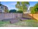 Fenced backyard with raised garden beds and privacy fence at 104 Wando Reach Rd, Wando, SC 29492
