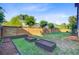 Large backyard with a wood fence and planter boxes for gardening at 104 Wando Reach Rd, Wando, SC 29492
