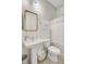 Cozy bathroom featuring a pedestal sink, toilet, and neutral-colored decor at 104 Wando Reach Rd, Wando, SC 29492