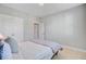 Bedroom with light walls, carpet, closet, and open door to other room at 104 Wando Reach Rd, Wando, SC 29492