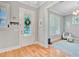 Bright and welcoming foyer featuring beautiful hardwood floors and ample natural light at 104 Wando Reach Rd, Wando, SC 29492