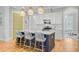 Kitchen island featuring granite countertops, stainless steel appliances and bar seating at 104 Wando Reach Rd, Wando, SC 29492