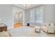 Bright living room with hardwood floors, neutral walls, and views into the foyer at 104 Wando Reach Rd, Wando, SC 29492