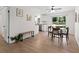 The dining room features light filled, an open concept, and wood look floors at 109 Sawmill Dr, Summerville, SC 29483