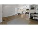 This living area has an open concept, neutral paint, and wood-look floors. The space is bright and airy at 109 Sawmill Dr, Summerville, SC 29483