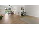 Open-concept living and dining area featuring lots of space, neutral walls, and durable wood-look floors at 109 Sawmill Dr, Summerville, SC 29483