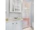 Bathroom featuring a sink, vanity, and mirror as seen from an open door to the Primary bedroom at 111 Elmwood Ave # A, Ladson, SC 29456