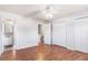 Bedroom with wood floors, ceiling fan, access to closet and en suite bathroom at 111 Elmwood Ave # A, Ladson, SC 29456