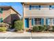 Charming townhouse exterior with a blue door and matching blue shutters at 111 Elmwood Ave # A, Ladson, SC 29456