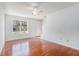 Inviting living room with wood floors, large window, and neutral walls that offer a bright atmosphere at 111 Elmwood Ave # A, Ladson, SC 29456