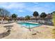 Community pool with lounge area, surrounded by well-maintained landscaping and villas at 111 Elmwood Ave # A, Ladson, SC 29456