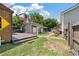 Private backyard features an American flag, a garden area and a charming workshop at 1125 Oceanview Rd, Charleston, SC 29412