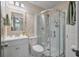 Bathroom with glass enclosed shower, vanity, and tiled walls at 1125 Oceanview Rd, Charleston, SC 29412