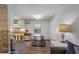 Open-concept space features updated flooring and seamlessly combines the living area with a cozy kitchen at 1125 Oceanview Rd, Charleston, SC 29412