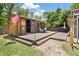 Charming outbuilding with wood deck and seating area, accented by a well-maintained yard at 1125 Oceanview Rd, Charleston, SC 29412