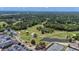 Panoramic aerial view of community amenities, golf course, and surrounding nature at 1129 Belvedere Ter, Mount Pleasant, SC 29464