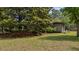 Spacious backyard with screened porch; ideal spot to relax and enjoy the outdoors at 1129 Belvedere Ter, Mount Pleasant, SC 29464