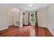 Sunny bedroom boasts hardwood floors, neutral walls, a window with curtains and recessed lighting at 1129 Belvedere Ter, Mount Pleasant, SC 29464