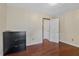 Neutral bedroom with hardwood flooring, double doors, and spacious layout at 1129 Belvedere Ter, Mount Pleasant, SC 29464