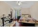 Cozy bedroom features hardwood floors, ceiling fan and a walk-in closet at 1129 Belvedere Ter, Mount Pleasant, SC 29464