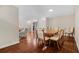 Inviting dining room with wood floors features a large table, seating for eight and neutral walls at 1129 Belvedere Ter, Mount Pleasant, SC 29464