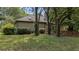 Charming home exterior with well-maintained landscaping and a serene, wooded backdrop at 1129 Belvedere Ter, Mount Pleasant, SC 29464