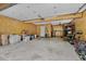 Large garage with wood paneling providing ample space for parking and storage at 1129 Belvedere Ter, Mount Pleasant, SC 29464