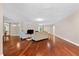 Bright living room with hardwood floors, neutral walls, comfortable furnishings, and a spacious open layout design at 1129 Belvedere Ter, Mount Pleasant, SC 29464