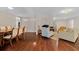Spacious living room with hardwood floors, comfortable seating, ample natural light, and an open layout concept at 1129 Belvedere Ter, Mount Pleasant, SC 29464