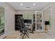 Bright office space with a computer, rolling chair, tile floors, natural light, and storage at 1129 Belvedere Ter, Mount Pleasant, SC 29464