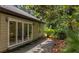 Covered patio with sliding glass doors, leading to a backyard oasis at 1129 Belvedere Ter, Mount Pleasant, SC 29464