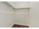 Functional walk-in closet with wood floors and built-in shelving, maximizing storage space at 1129 Belvedere Ter, Mount Pleasant, SC 29464