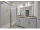 Elegant bathroom showcasing a double vanity with granite countertops and a spacious glass-enclosed shower at 114 Rowans Creek Dr, Charleston, SC 29492