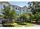 Inviting townhouse with well-manicured lawn and lush landscaping for an inviting curb appeal at 114 Rowans Creek Dr, Charleston, SC 29492