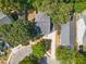 Aerial view of a home on a verdant lot, showcasing its proximity to nearby streets and mature trees at 1199 Landau Ln, Mount Pleasant, SC 29466