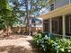 A delightful backyard featuring a play set and beautiful hydrangea bushes near the screened in porch at 1199 Landau Ln, Mount Pleasant, SC 29466